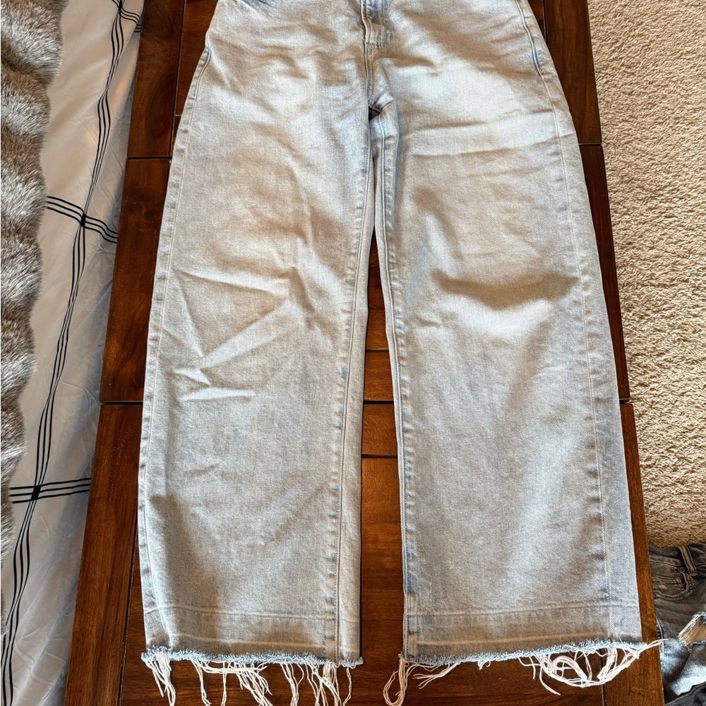PAIGE Light Blue Wide Leg Jeans with Frayed Hem